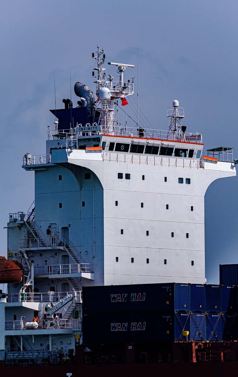 18563677 - cargo ship in port view of the stern